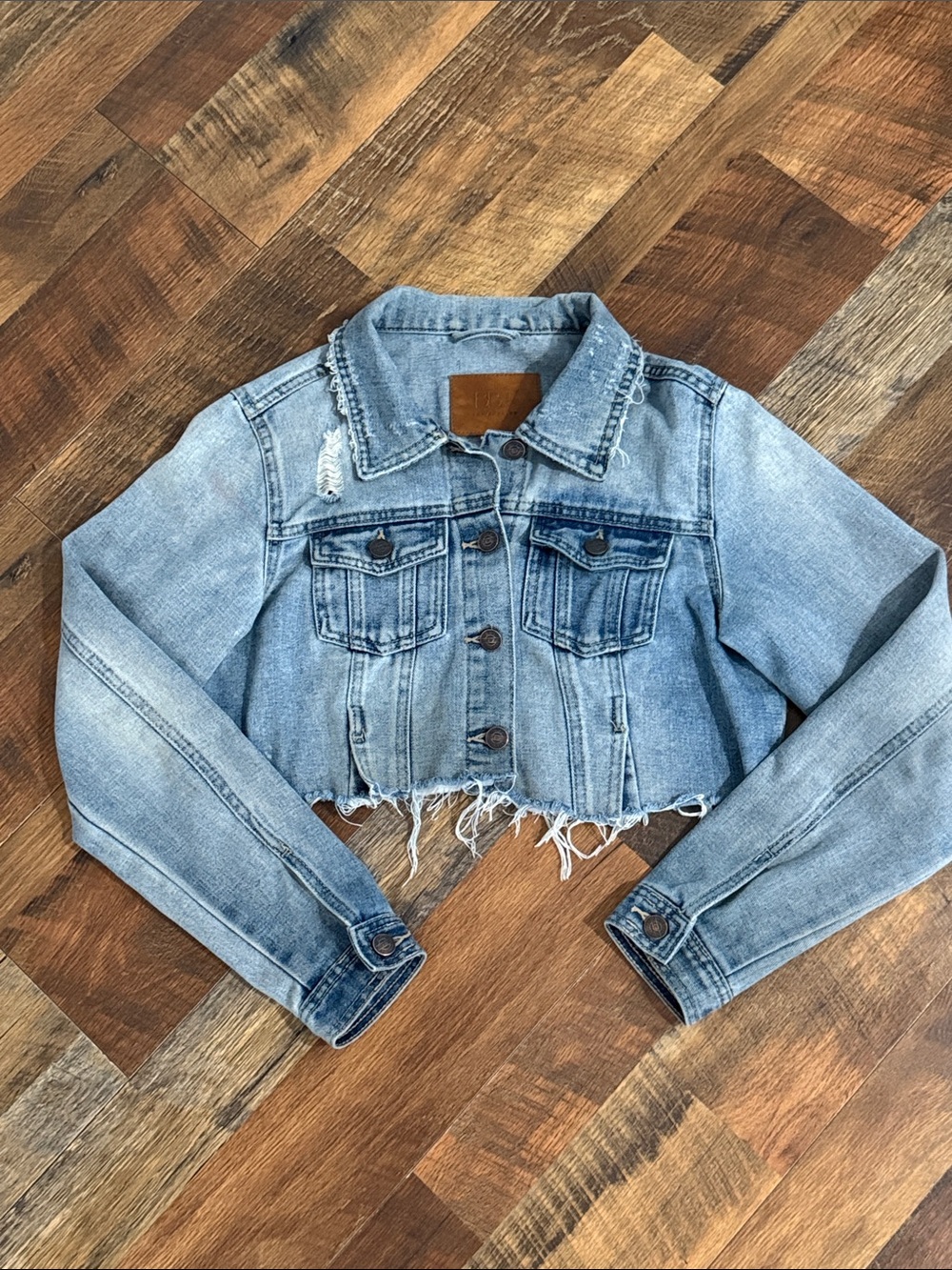 BBJ Los Angeles Cropped Distressed Denim Jacket Light Wash Raw Hem